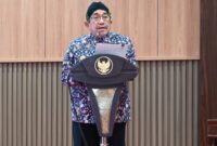 KH Imam Hasyim, Wakil Bupati saat menyampaikan nota penjelasan atas Rancangan Peraturan Daerah (Raperda) tentang Pembentukan Dana Cadangan Pemilihan Bupati dan Wakil Bupati Sumenep Tahun 2029, pada Rapat Paripurna Dewan Perwakilan Rakyat Daerah