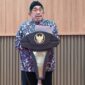 KH Imam Hasyim, Wakil Bupati saat menyampaikan nota penjelasan atas Rancangan Peraturan Daerah (Raperda) tentang Pembentukan Dana Cadangan Pemilihan Bupati dan Wakil Bupati Sumenep Tahun 2029, pada Rapat Paripurna Dewan Perwakilan Rakyat Daerah